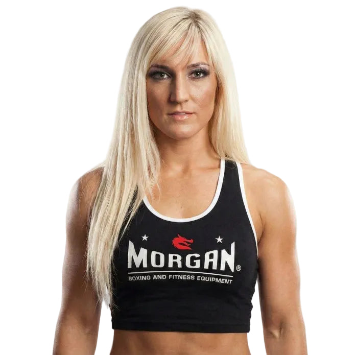 Woman wearing a black tank top with 'Morgan' branding on a white background